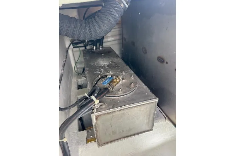 Slide: The Image of 2024 Bluewhale 3600 WA engine compartment with metal components and wiring. - 29