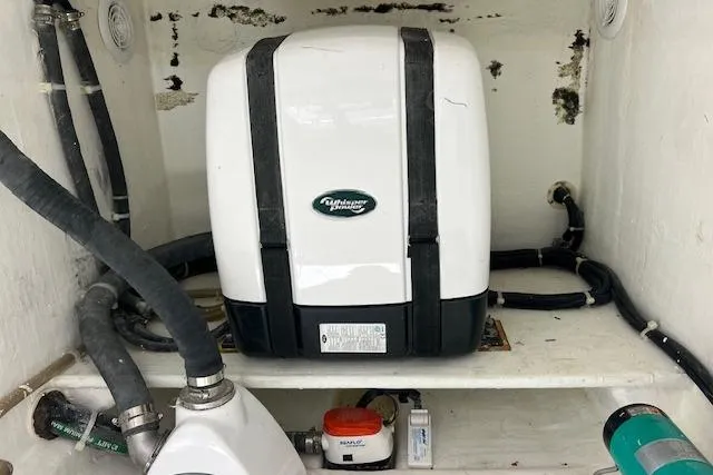 Slide: The Image of 2024 Bluewhale 3600 WA engine compartment with pipes and equipment. - 31