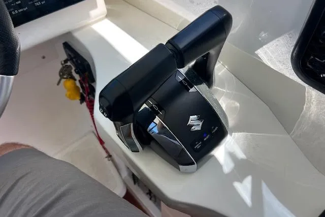 Slide: The Image of Boat throttle control on 2024 Bluewhale 3600 WA, featuring Suzuki branding. - 35