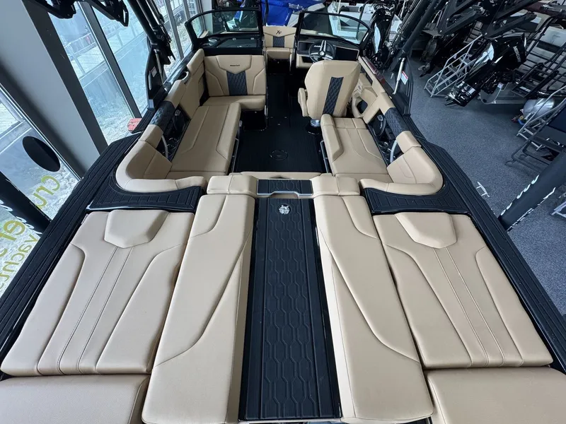 Slide: The Image of Interior view of a luxury boat with beige seating and modern design. - 5