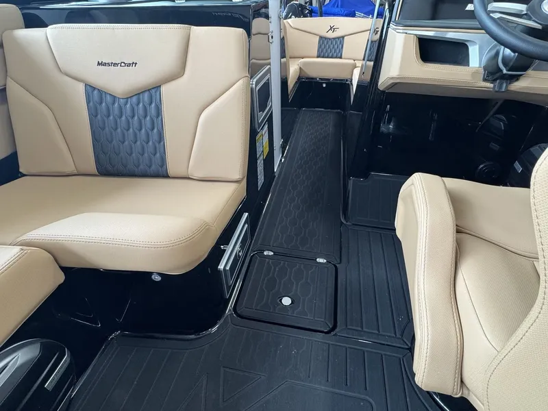 Slide: The Image of Interior of a 2026 MasterCraft XT22 with beige seating and modern design. - 20