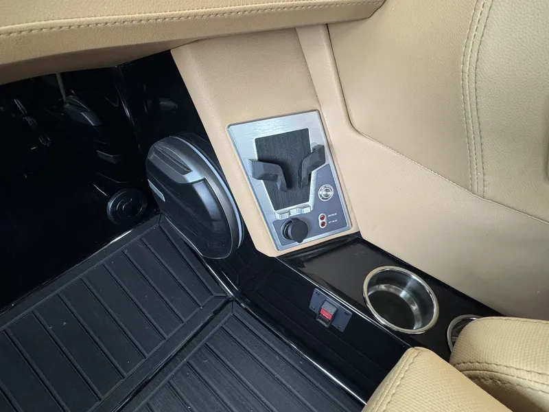 Slide: The Image of Close-up of a 2026 MasterCraft XT22 interior with speaker and cup holder. - 15