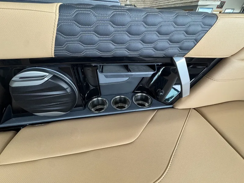 Slide: The Image of Interior view of a 2026 MasterCraft XT22 with sleek seating and cup holders. - 9