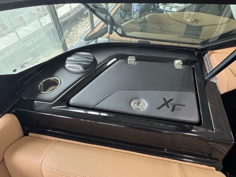 Slide: The Image of The image shows the interior of a 2026 MasterCraft XT22 with sleek details. - 23