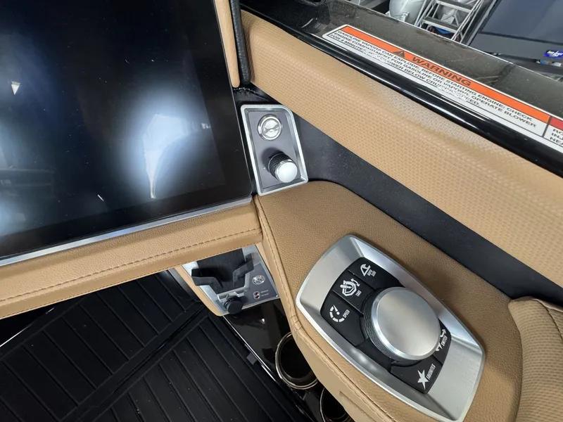 Slide: The Image of The image shows the dashboard of a 2026 MasterCraft XT22 with a large screen and controls. - 18
