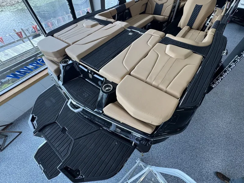Slide: The Image of MasterCraft XT22 2026: Luxurious interior with beige upholstery and black accents, ideal for comfort. - 3
