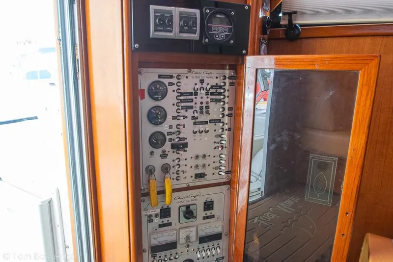 Slide: The Image of Electrical control panel on a 1988 Chris-Craft 482 Convertible boat. - 22