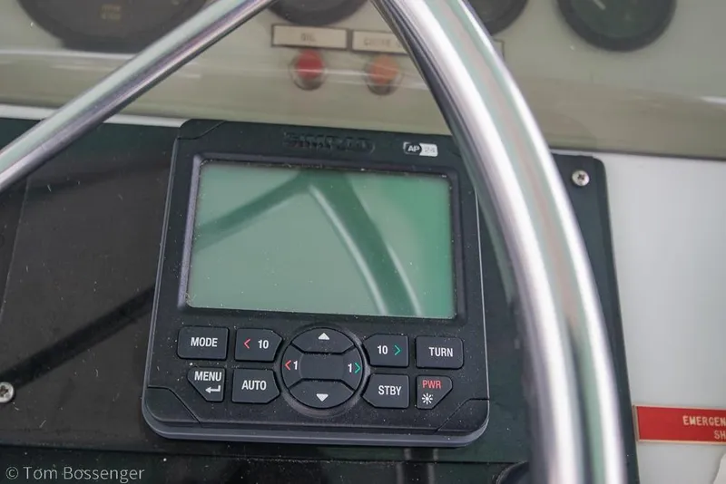 Slide: The Image of Close-up of a navigation control panel on a 1988 Chris-Craft 482 Convertible boat. - 32