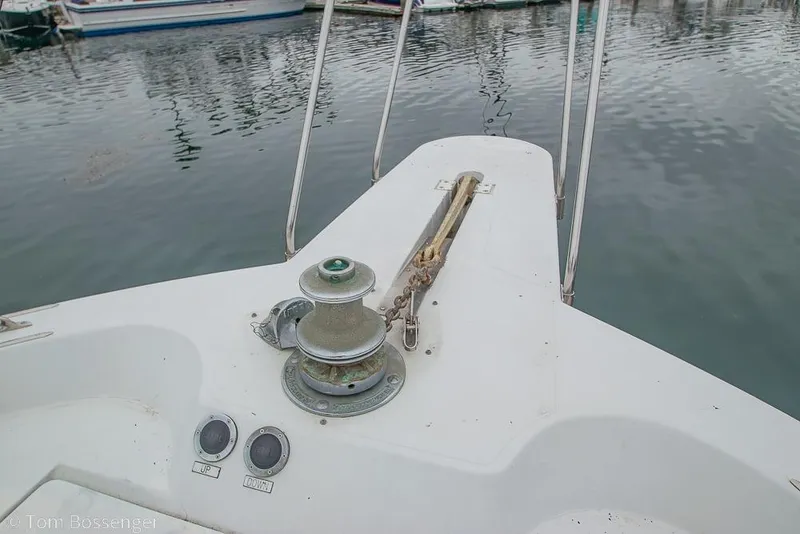 Slide: The Image of Bow of 1988 Chris-Craft 482 Convertible with anchor winch and controls. - 39