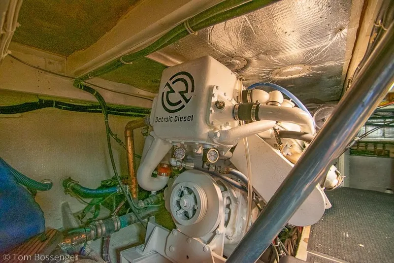 Slide: The Image of Engine room of 1988 Chris-Craft 482 Convertible with Detroit Diesel engine. - 44