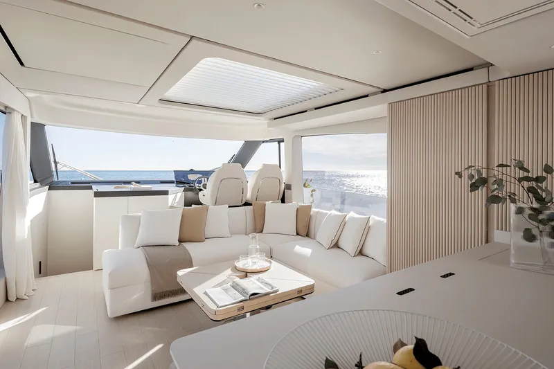 Slide: The Image of The image shows the luxurious interior of a 2027 Azimut Seadeck 6 yacht with modern furnishings. - 14