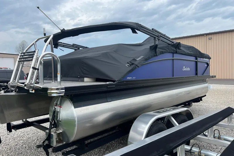 The Image of 2023 Barletta C22 pontoon boat on trailer, covered and ready for transport. - 0