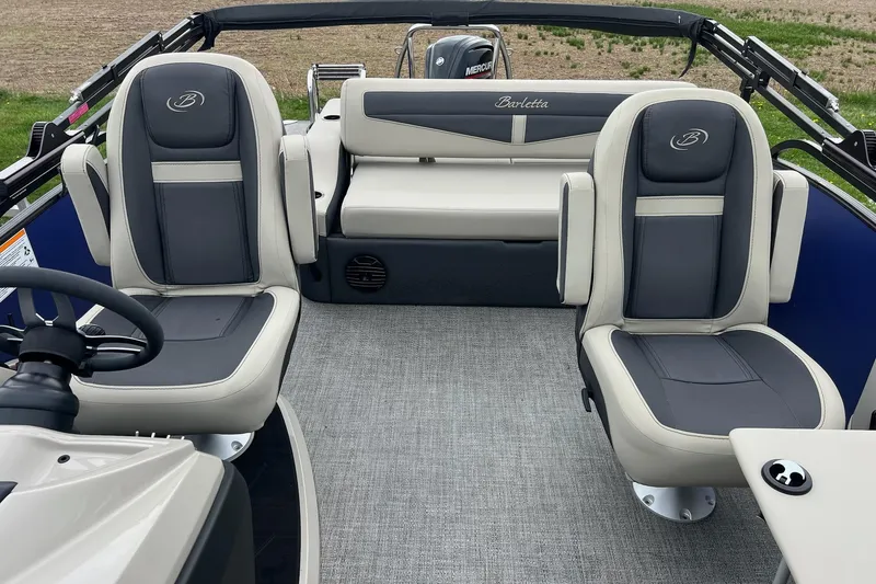 Slide: The Image of 2023 Barletta C22 boat interior with plush seating and modern design. - 14