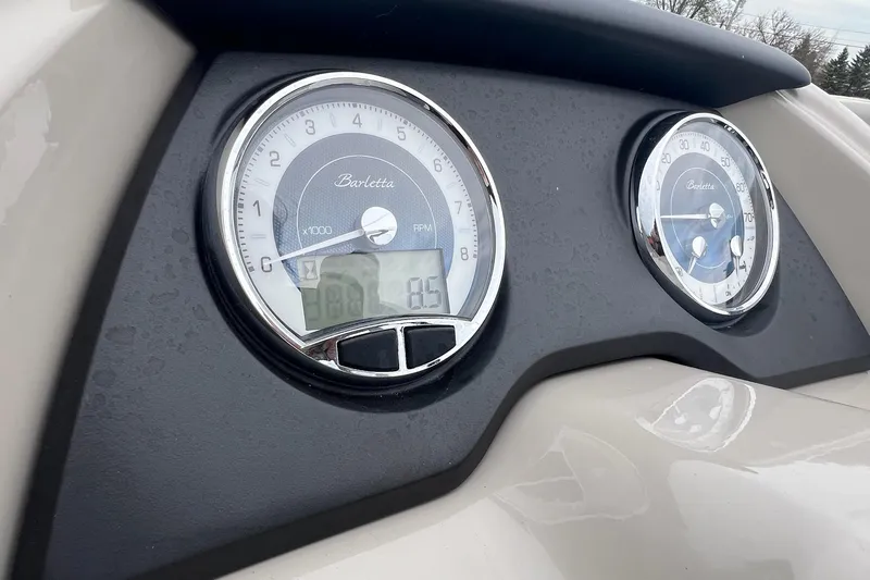 Slide: The Image of Dashboard of 2023 Barletta C22 boat with RPM and speed gauges. - 19