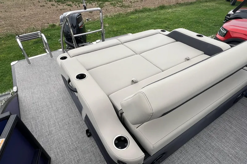 Slide: The Image of 2023 Barletta C22 pontoon boat with spacious seating and cup holders on deck. - 20