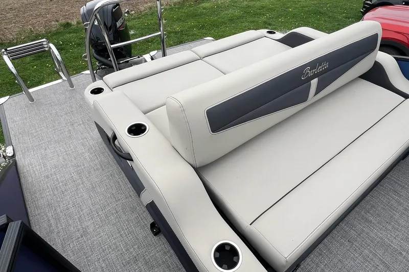 Slide: The Image of 2023 Barletta C22 boat with comfortable seating and cup holders on deck. - 21