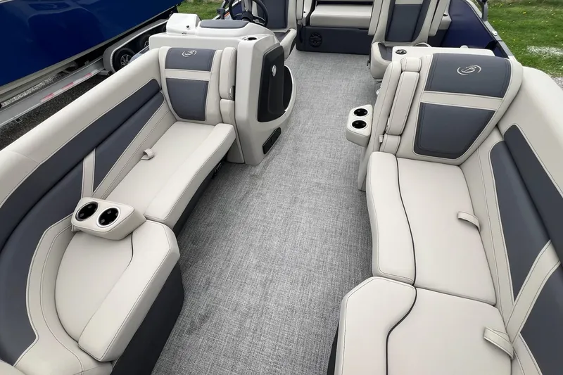 Slide: The Image of 2023 Barletta C22 pontoon boat interior with plush seating and cup holders. - 29