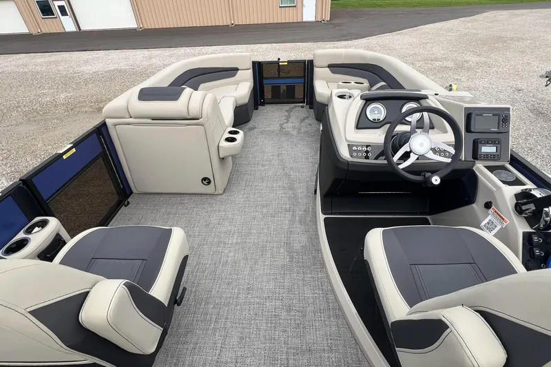 Slide: The Image of 2023 Barletta C22 pontoon boat interior with modern seating and steering console. - 30