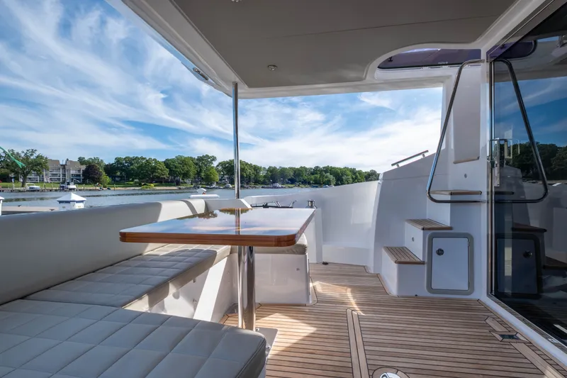 Slide: The Image of Azimut 50 Fly 2018 yacht with elegant deck and lake view. - 13