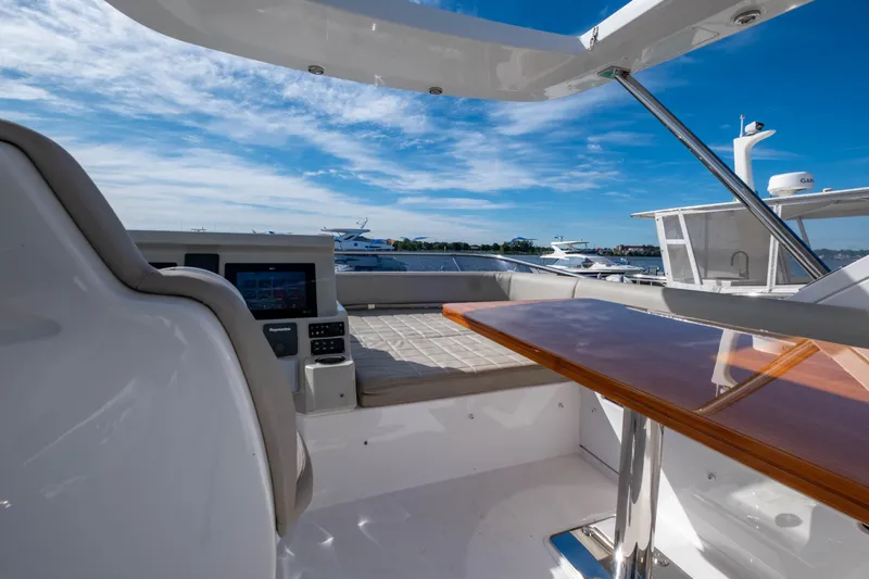 Slide: The Image of Azimut 50 Fly 2018 yacht with modern cockpit and sea view. - 23