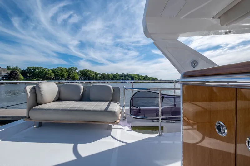 Slide: The Image of Luxurious Azimut 50 Fly deck with sofa, water view. - 25