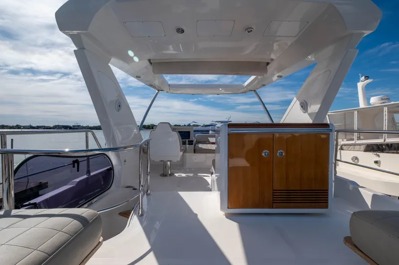 Slide: The Image of Azimut 50 Flybridge 2018 with modern design on the water. - 26