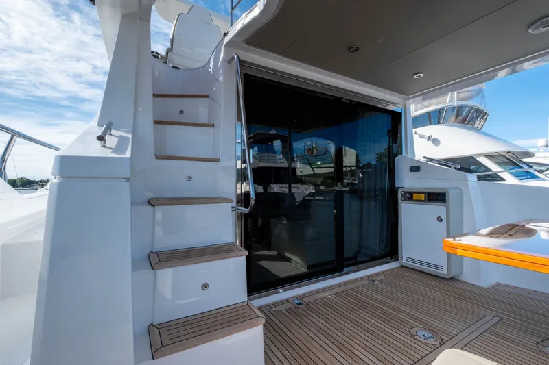 Slide: The Image of Azimut 50 Fly 2018 yacht with staircase and deck view. - 34
