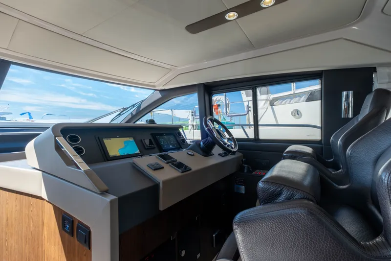 Slide: The Image of Interior of 2018 Azimut 50 Fly with modern helm console. - 46