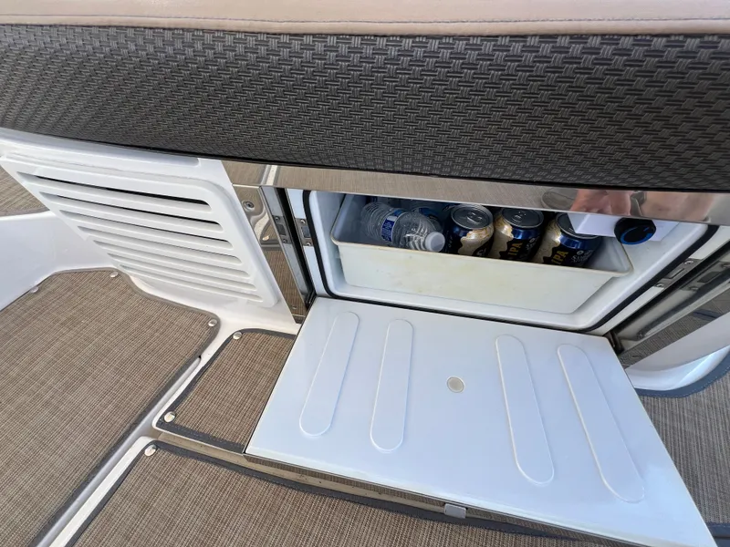 Slide: The Image of Fridge in 2018 Sea Ray Sundancer 350 Coupe with drinks. - 14