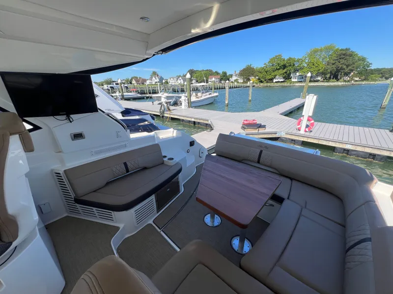 Slide: The Image of Interior of 2018 Sea Ray Sundancer 350 Coupe at dock. - 17