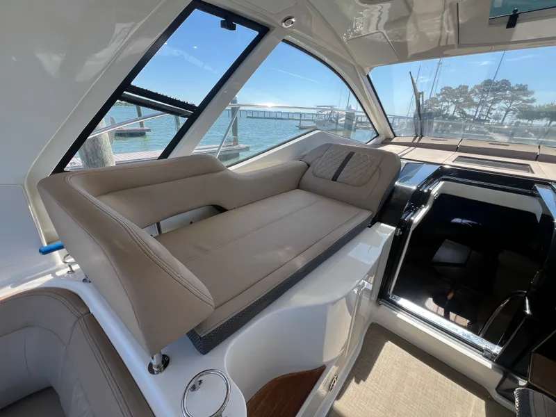 Slide: The Image of Interior of 2018 Sea Ray Sundancer 350 Coupe with lounge seating. - 19