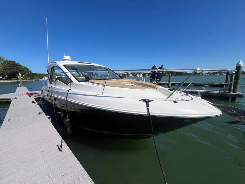 Slide: The Image of 2018 Sea Ray Sundancer 350 Coupe at dock, sunny day. - 4
