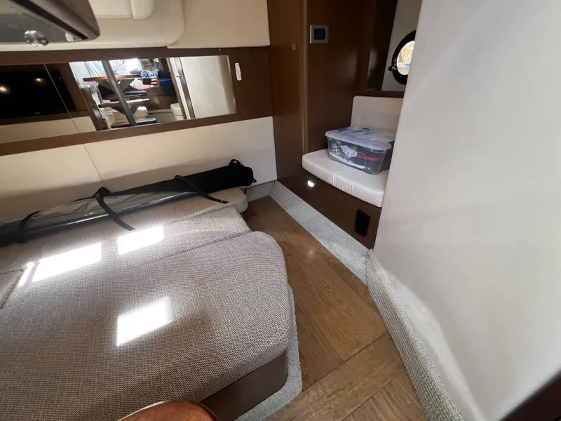 Slide: The Image of Interior of 2018 Sea Ray Sundancer 350 Coupe with cozy seating area. - 40