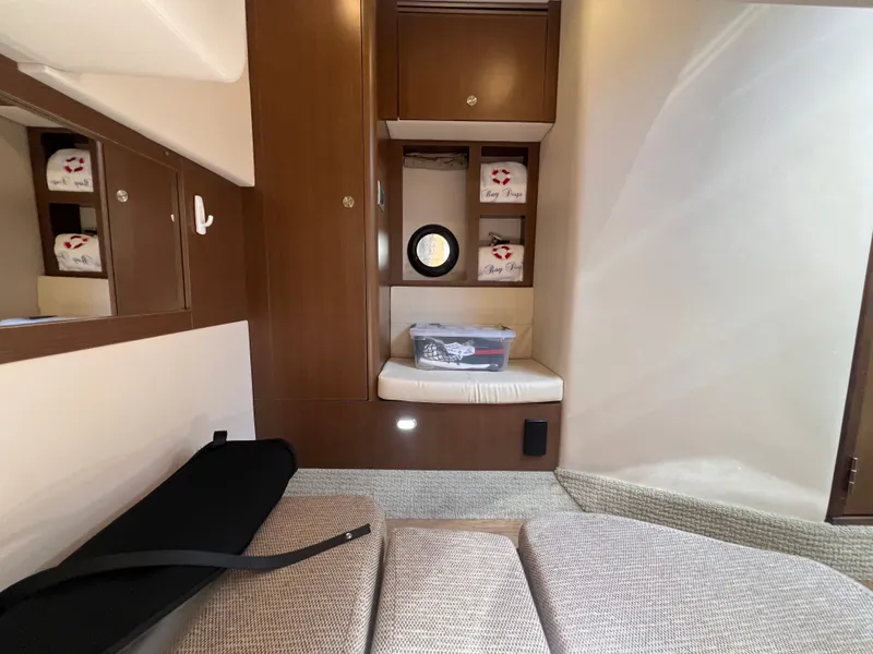 Slide: The Image of Interior of 2018 Sea Ray Sundancer 350 Coupe with wood paneling. - 42