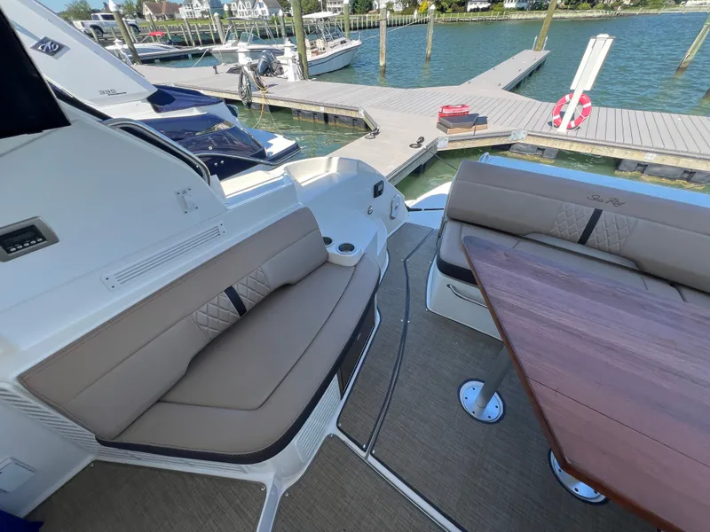 Slide: The Image of Interior of a 2018 Sea Ray Sundancer 350 Coupe yacht at the dock. - 48