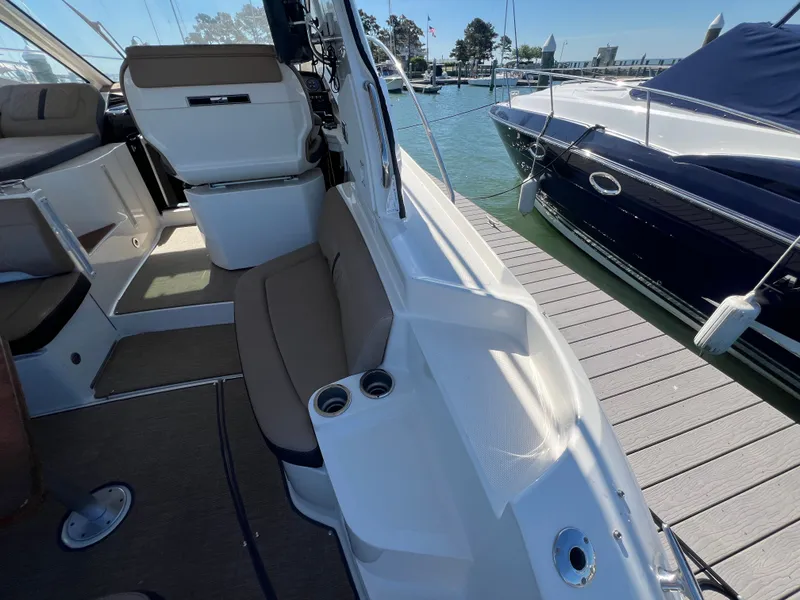 Slide: The Image of Interior of a 2018 Sea Ray Sundancer 350 Coupe at the dock. - 49