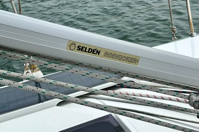 Slide: The Image of Seldén Rodkicker on 2016 Hanse 455 sailboat with ropes and water background. - 100