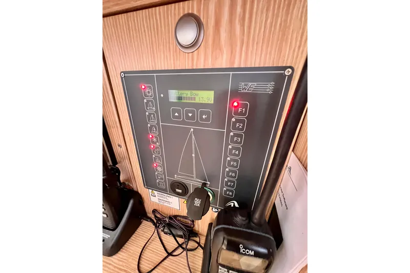 Slide: The Image of Control panel on a 2016 Hanse 455 yacht, featuring navigation and system indicators. - 107