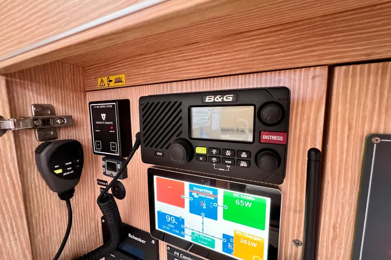 Slide: The Image of Control panel of a 2016 Hanse 455 yacht featuring B&G V50 marine radio. - 108