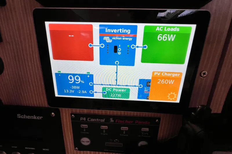 Slide: The Image of Control panel display on a 2016 Hanse 455 yacht showing power management details. - 109