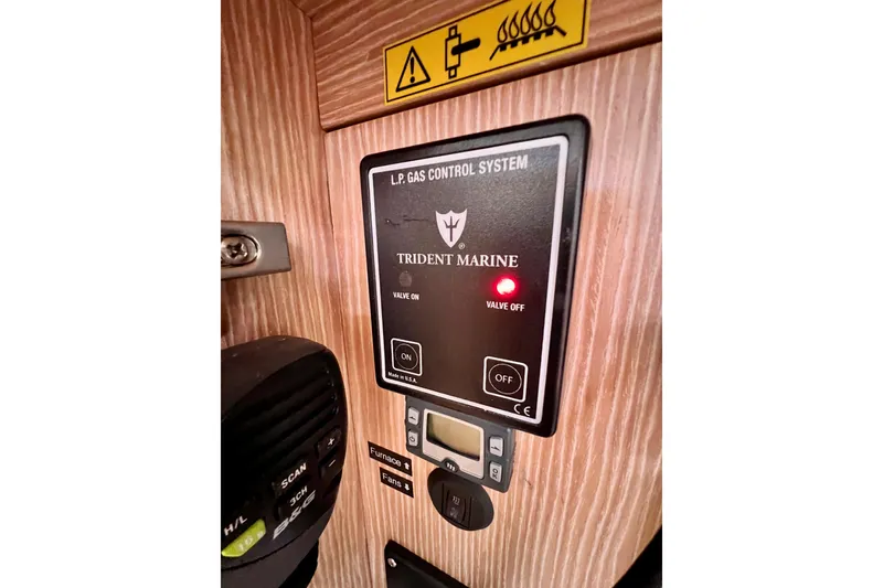 Slide: The Image of LP gas control system panel on 2016 Hanse 455 yacht, featuring Trident Marine controls. - 111