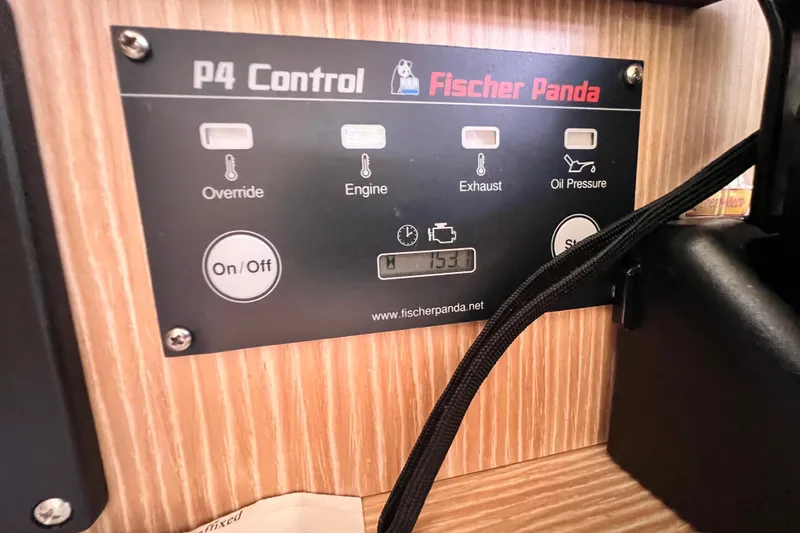Slide: The Image of Fischer Panda P4 Control panel on 2016 Hanse 455 yacht, displaying engine and oil pressure indicators. - 112