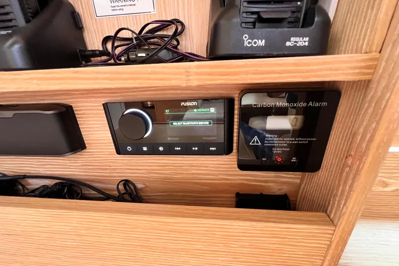 Slide: The Image of Control panel with Fusion stereo and carbon monoxide alarm on a 2016 Hanse 455 yacht. - 114