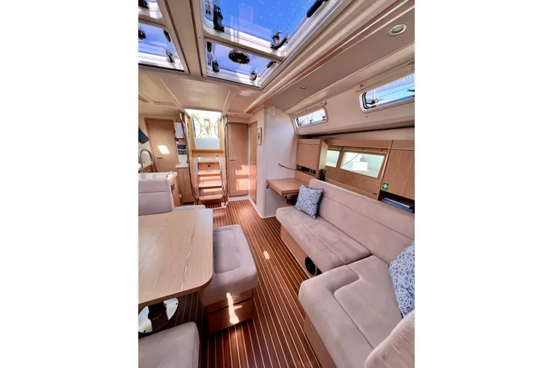 Slide: The Image of Interior of 2016 Hanse 455 yacht with modern furnishings and skylights. - 132