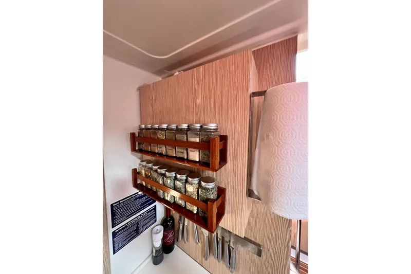 Slide: The Image of Spice rack and paper towel holder in 2016 Hanse 455 yacht kitchen. - 148