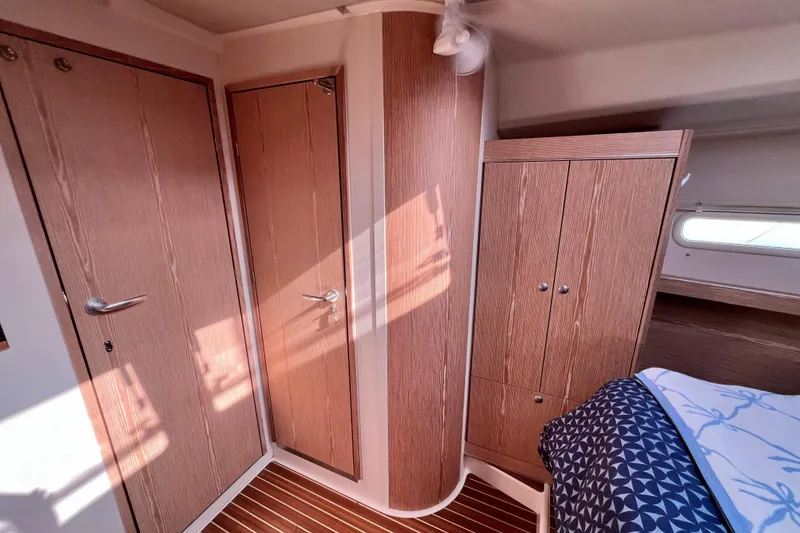 Slide: The Image of Interior of 2016 Hanse 455 yacht with wooden cabinetry and modern design. - 160