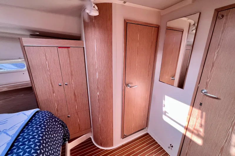 Slide: The Image of Interior of 2016 Hanse 455 yacht with wooden cabinetry and modern design. - 165