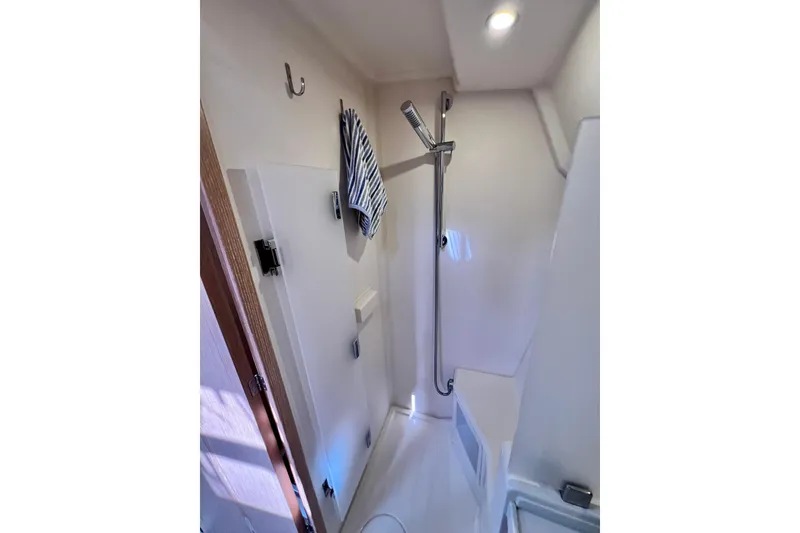 Slide: The Image of Bathroom interior of 2016 Hanse 455 yacht with shower and towel hook. - 180