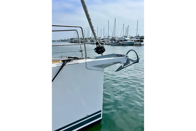 Slide: The Image of Bow of 2016 Hanse 455 yacht with anchor, docked in marina. - 19