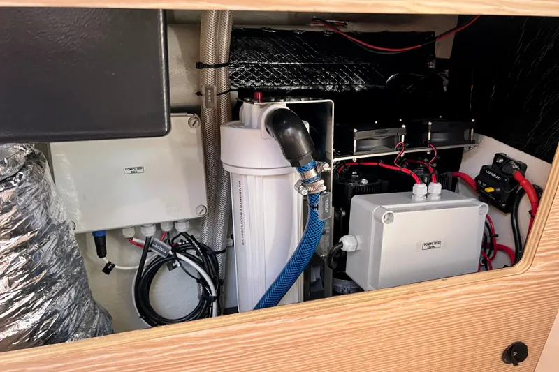 Slide: The Image of Electrical and plumbing systems inside a 2016 Hanse 455 yacht. - 192